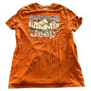 Jeep orange graphic t shirt white blue mountain range and sky